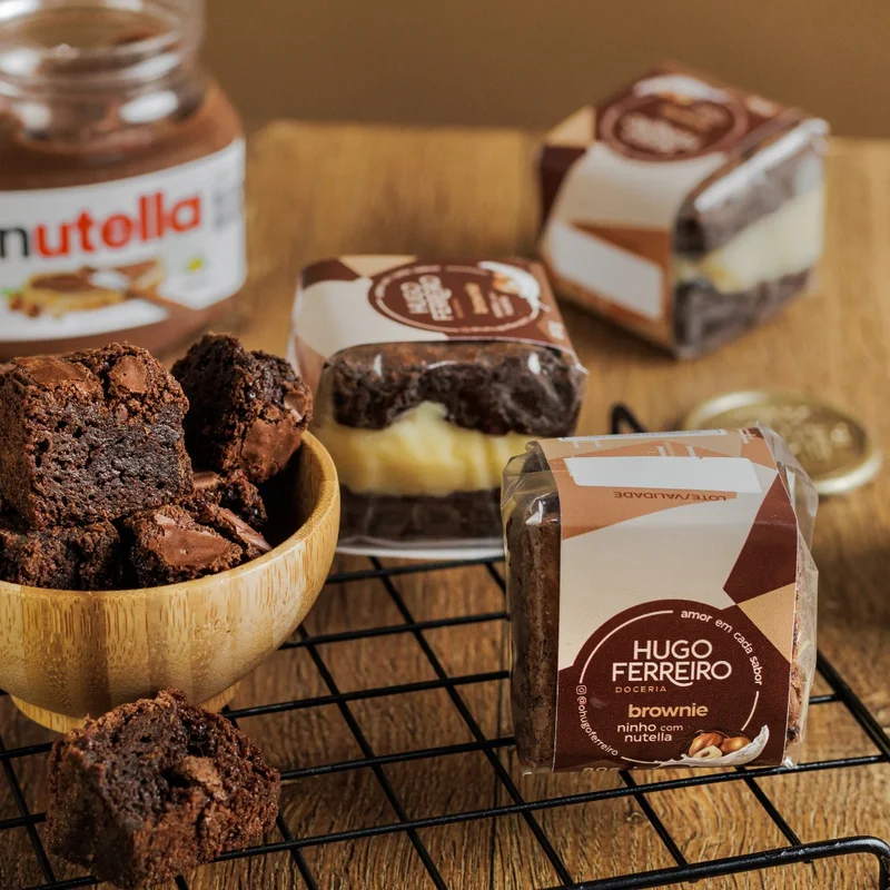 Linha de doces artesanais e alfajores embalados para revenda
